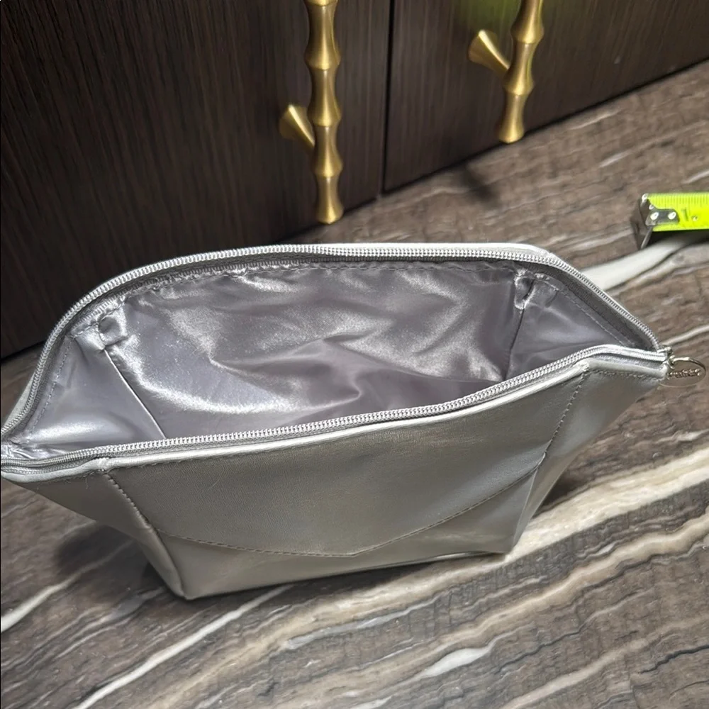 La Prairie Silver Cosmetic Bag with Geometric Design